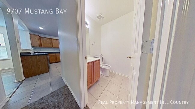 Building Photo - 9707 Mustang Bay