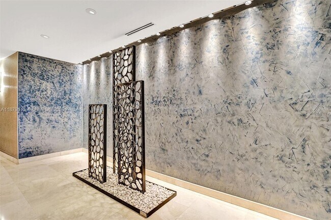 Building Photo - 16001 Collins Ave