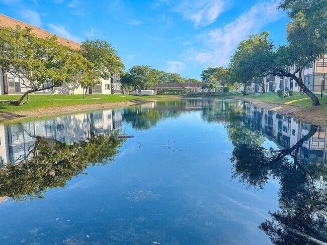 Building Photo - 6090 N Sabal Palm Blvd
