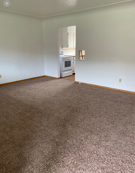 Looking across large living room to the kitchen - 4605 Otis St