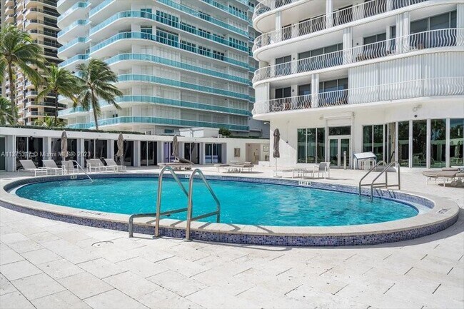 Building Photo - 10155 Collins Ave