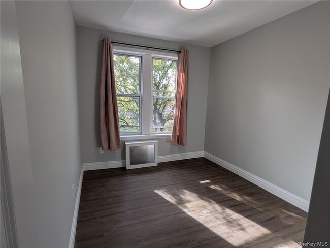 Building Photo - 205-17 Hollis Ave