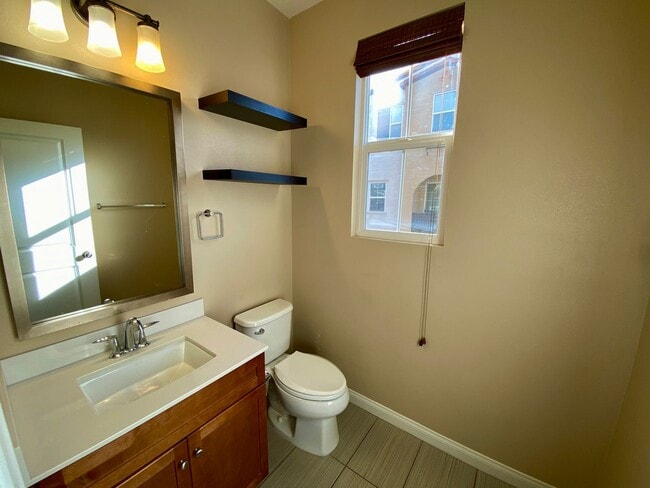 Building Photo - Stylish 3-Story Townhome with Balconies & Open-Concept Living