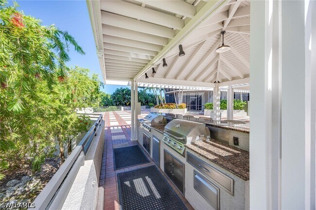 Building Photo - 6075 Pelican Bay Blvd