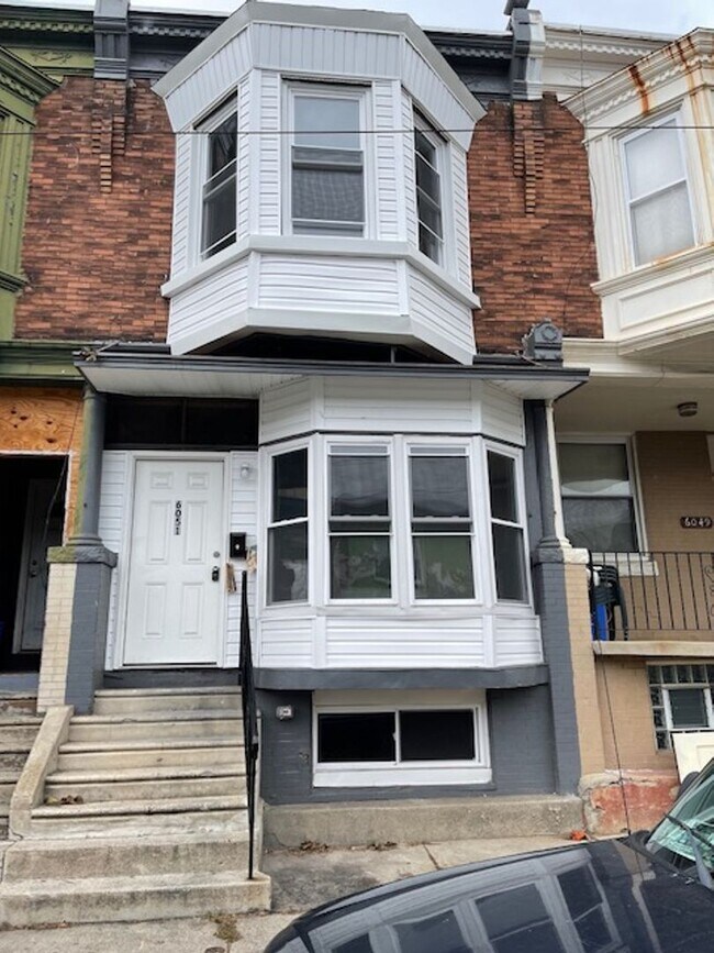 Building Photo - 6051 W Girard Ave