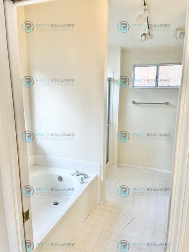 Building Photo - Well-Appointed 4BR Home with Open Floorplan & Expansive Yard