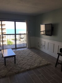 Building Photo - Fully Furnished 1 Bedroom Condo with an Oc...