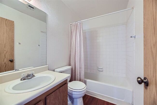 Building Photo - 2nd Story 2-Bed Condo with Tile Fireplace