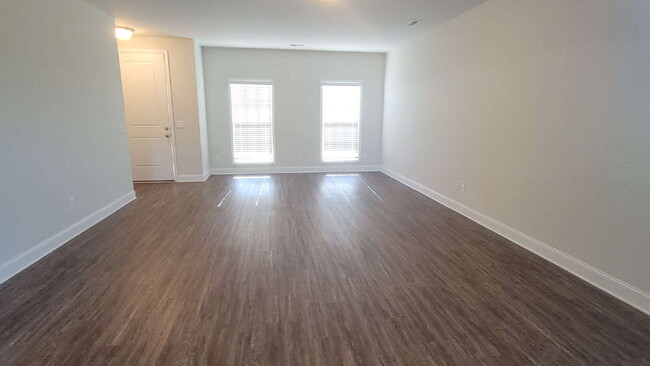 Building Photo - "Spacious 4-Bedroom Retreat with Modern Gr...