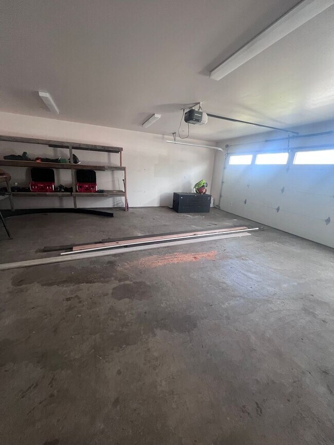 Building Photo - 2 Bedroom 1 bath house with extra large double car garage and extra storage space!