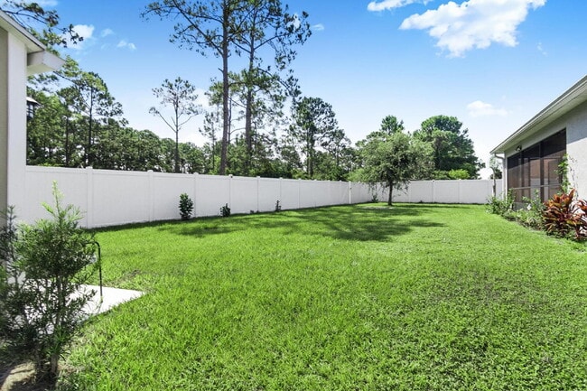 Building Photo - Modern 4-Bedroom, 3-Bath Home with Private In-Law Suite – Palm Coast, FL