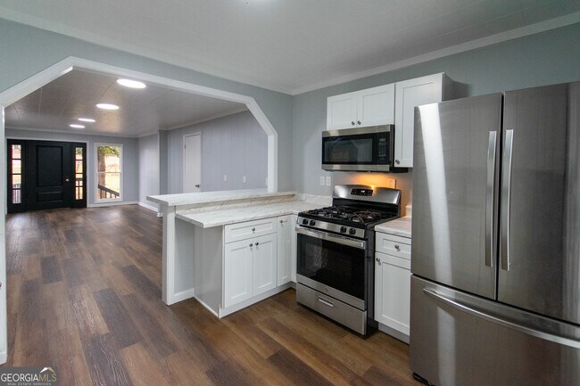 Building Photo - 7971 Roosterville Rd