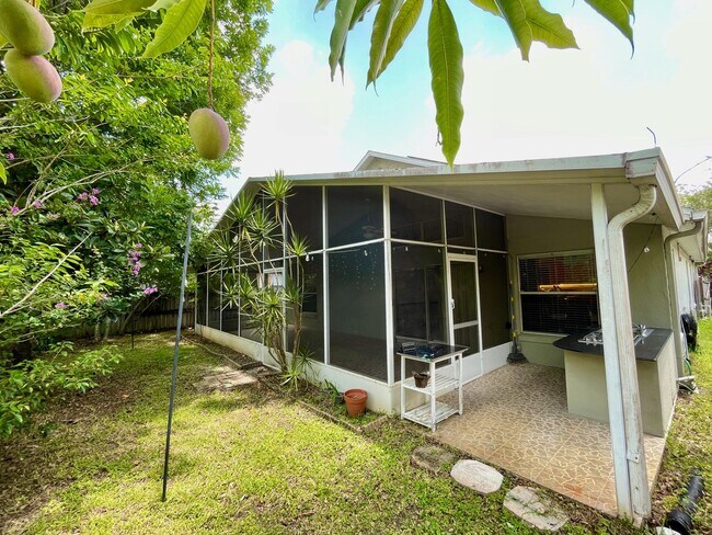 Building Photo - Modern 4-Bed, 2-Bath Solar-Powered Home Near UCF