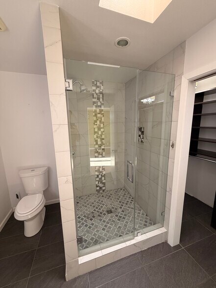 Primary shower with walk-in closet - 3414 Winged Foot Ct
