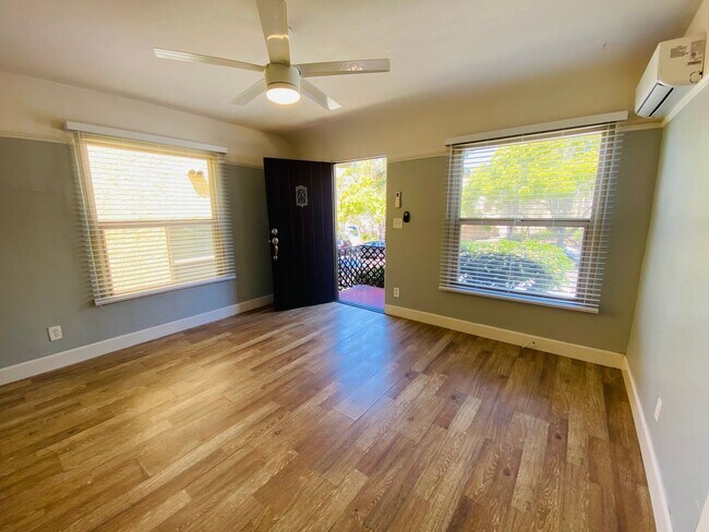 Building Photo - Charming 1 Bedroom North Park Apartment! Assigned Garage! Patio! In Unit Wash/Dryer!