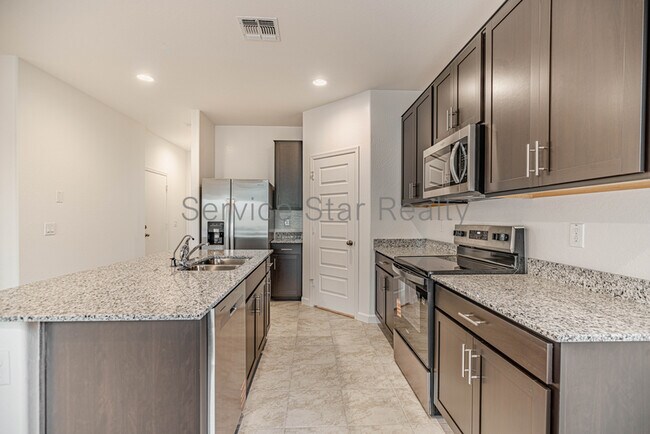 Building Photo - 5549 E Cinder Ln