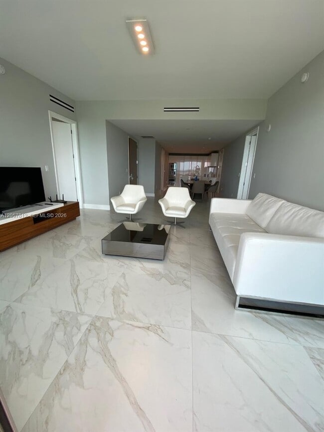 Building Photo - 10201 Collins Ave