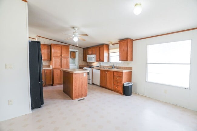 Building Photo - Spacious Home with Over-sized 2 Car Garage