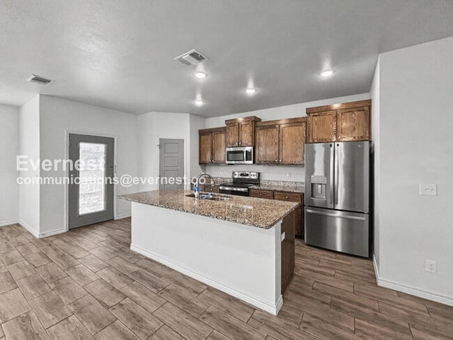 Building Photo - Limited Time Special Offer / 4 Bed, 2 Bath Home with Garage / Pet-Friendly / Vouchers Accepted / ...