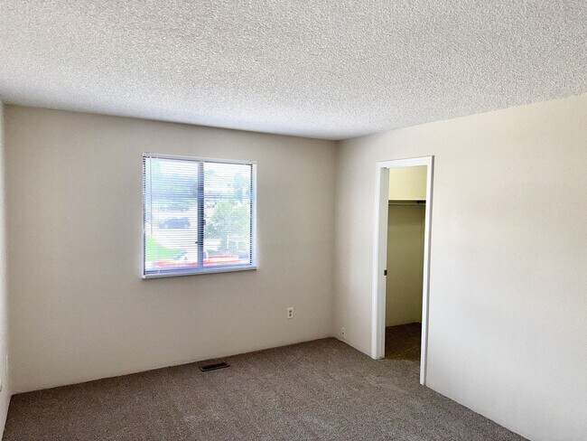 Building Photo - Updated Two Bed Townhome Nestled in the He...