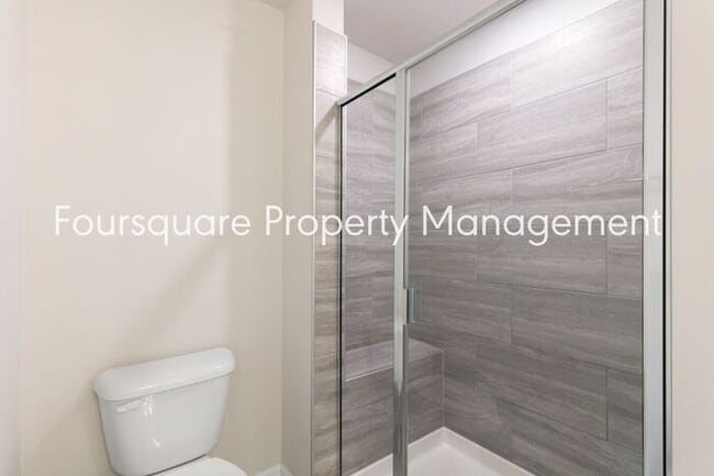 Building Photo - Stylish 3-Level Townhome with Bonus Suite, Deck & Garage – Near I-540 and Shopping