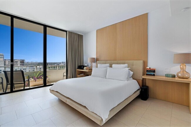 Building Photo - 10205 Collins Ave