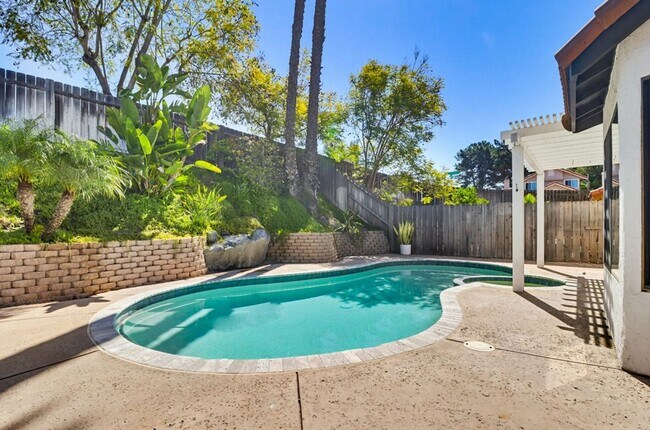 Building Photo - Stunning Upgraded 4BR Home with Pool in Desirable Rancho San Diego – Move-In Ready