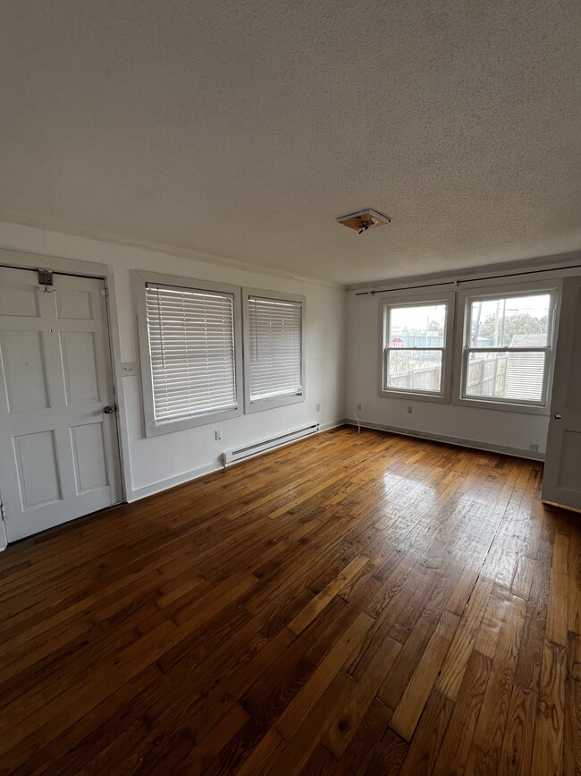 Nice sized living room, with dining room/office there is a lot of common space - 1903 Hampton Ave