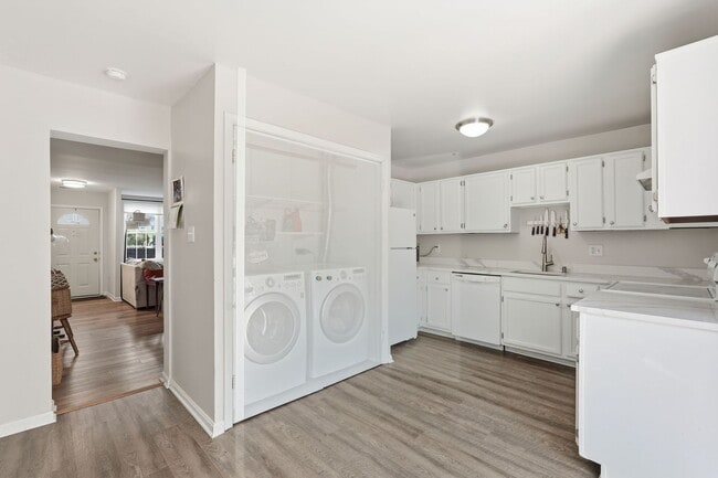 Building Photo - This beautifully refreshed condominium offers a refined blend of style and comfort