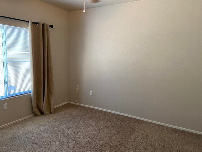 Building Photo - 7050 E Sunrise Dr