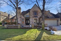 Building Photo - Exquisite custom home with high end finishes located in the gated community of Maple Ridge Village