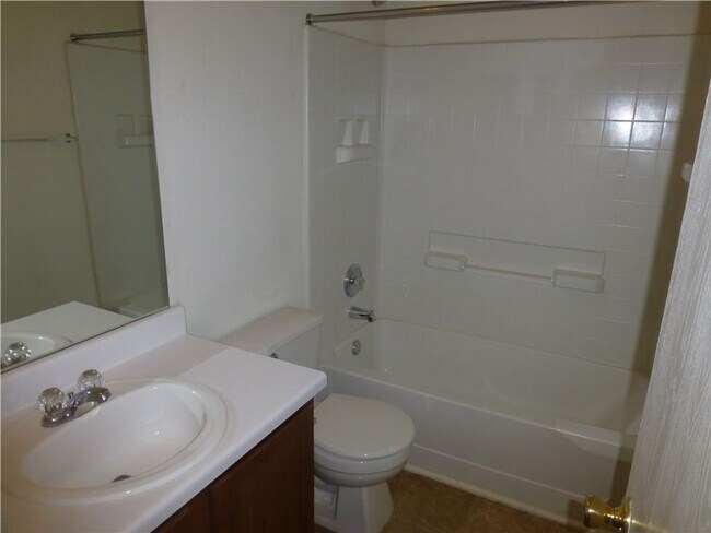 Building Photo - Generous Four Bedroom, Three Bath Home with Large Yard