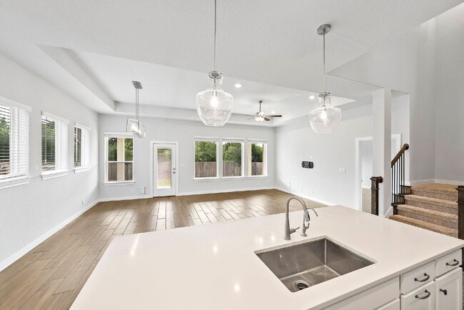 Building Photo - Greenbelt. 3 Car Garage. Built In Dog Room.