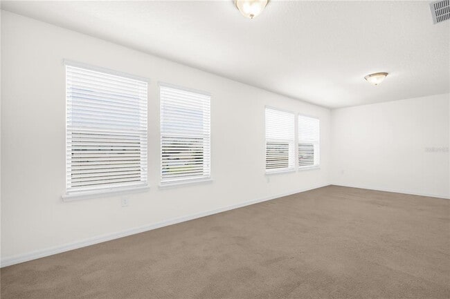 Building Photo - 8130 Red Stopper Ln