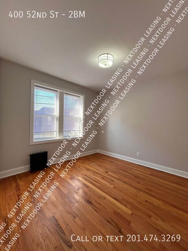 Building Photo - 400 52nd St