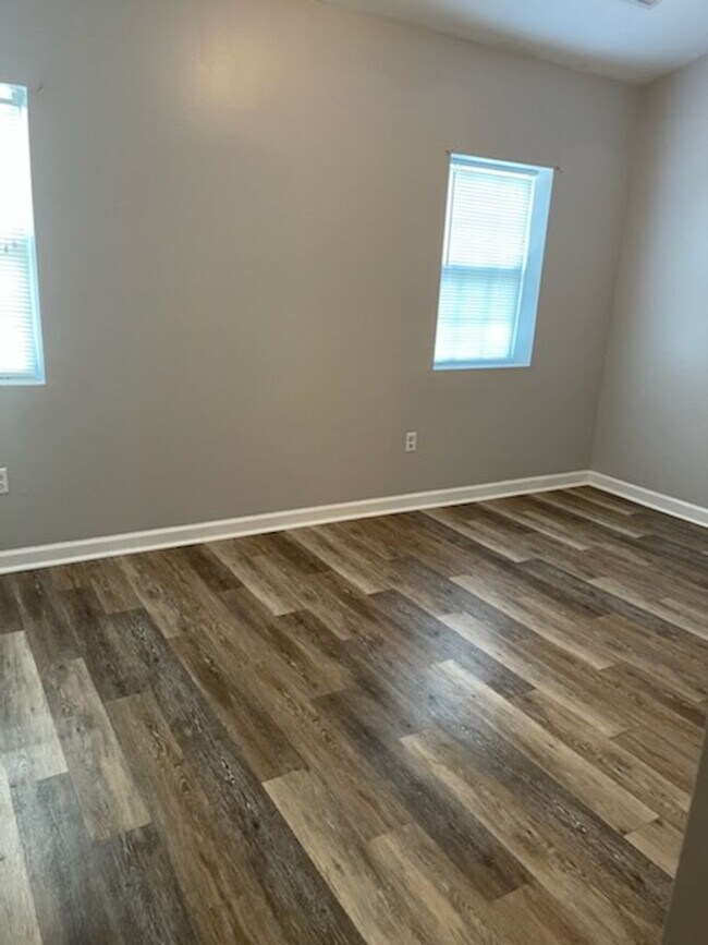 Building Photo - Stylish Remodel • Budget-Friendly