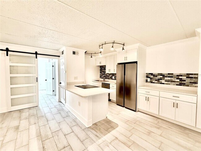 Building Photo - 8901 Blind Pass Rd