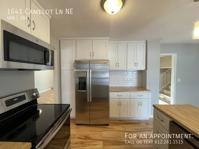 Building Photo - 1641 Camelot Ln NE