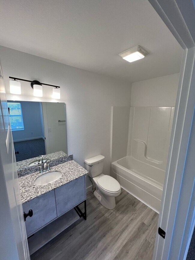 Building Photo - LEASING SPECIAL! 1/2 OFF FIRST MONTHS RENT - Featherston Village - Modern Living - 2 Bedroom/2.5 ...