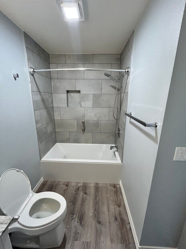 Building Photo - Spacious Duplex with 3-Car Garage & Private Patio!