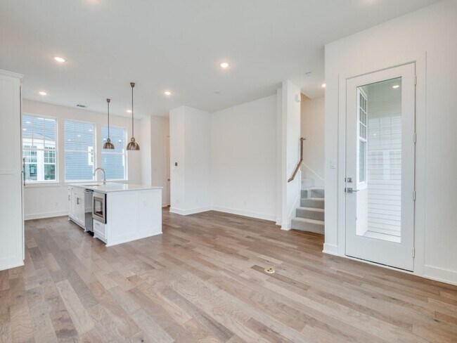 Building Photo - Welcome to a beautiful Craftsman-style end...