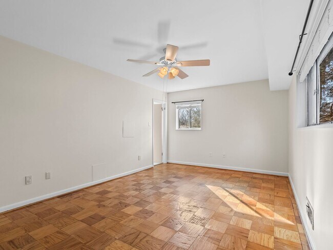 Building Photo - Commuter’s Dream! Large 2BR/2BA Condo Steps from Metro – All Utilities Included!