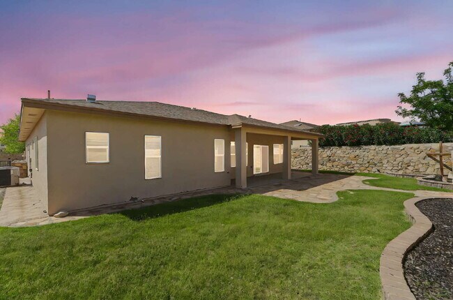 Building Photo - "Spacious 4-Bed Oasis with Granite Touches...