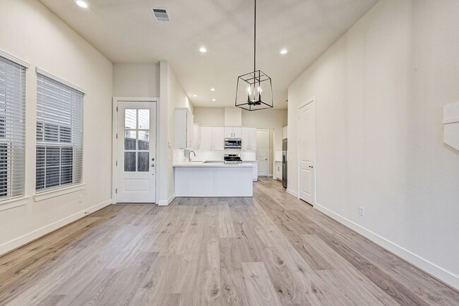 Building Photo - This beautiful modern two-story home for rent