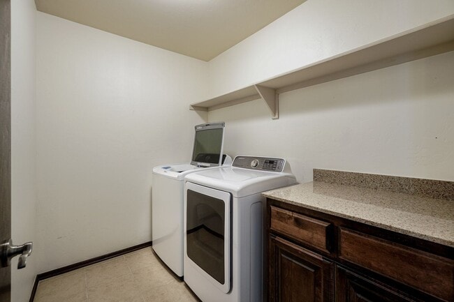 Building Photo - Stunning 4-Bedroom Home with Fireplace, Island Kitchen, 3-Car Garage & Large Backyard!