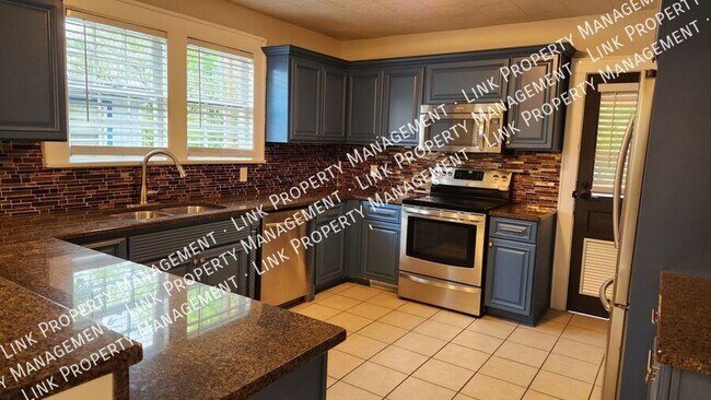 Building Photo - Charming Fully Renovated 4-Bedroom Home in...