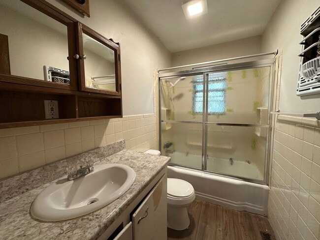 Building Photo - Welcome to this conveniently located 2-bed...