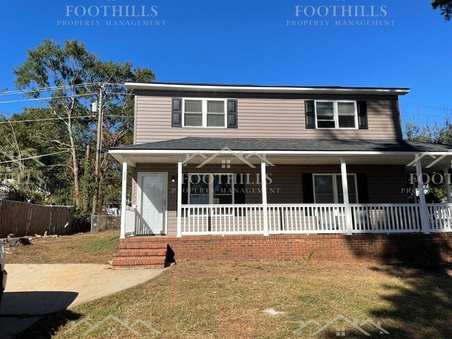 Primary Photo - 2-Bedroom Home with Fenced Backyard and Ap...