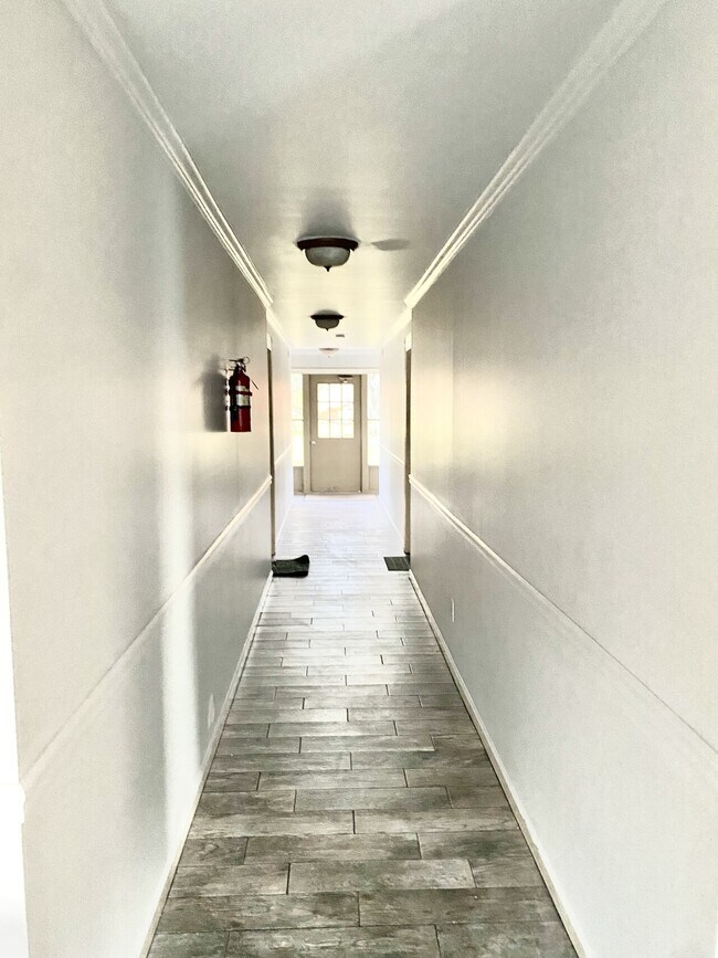 Building Photo - Clinton Condo 36A