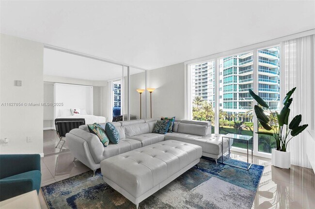 Building Photo - 10275 Collins Ave